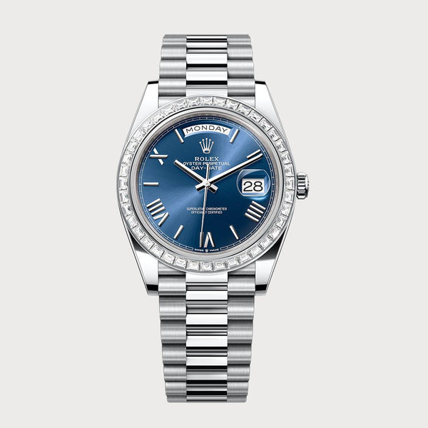 Rolex Day-Date 40 Blue Roman Dial & Baguette Diamond Bezel In Platinum