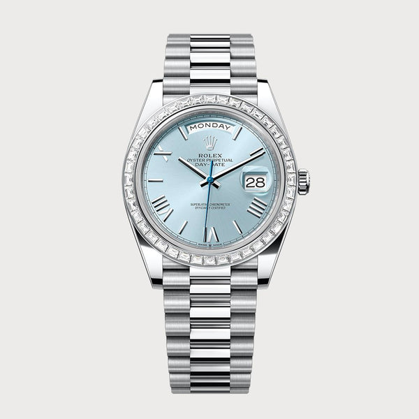 Rolex Day-Date 40 Ice Blue Roman Dial & Baguette Diamond Bezel In Platinum