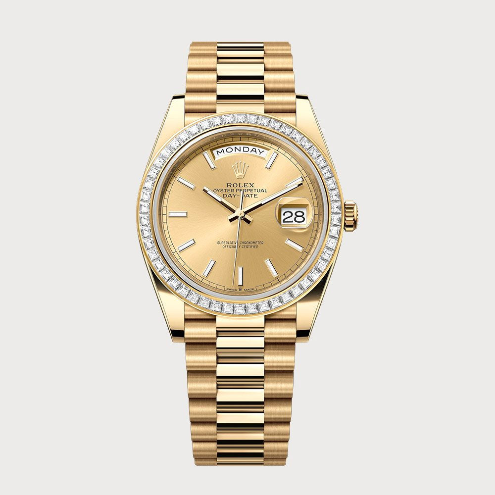 Rolex Day-Date 40 Champagne Dial With Baguette Diamond Bezel In Yellow Gold