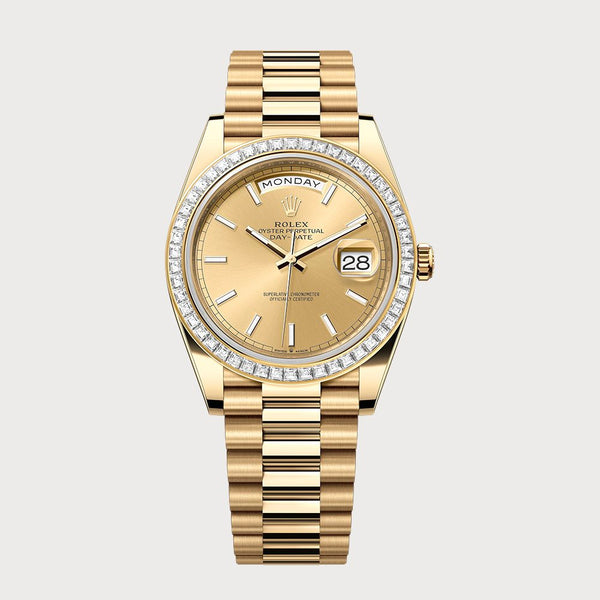 Rolex Day-Date 40 Champagne Dial With Baguette Diamond Bezel In Yellow Gold