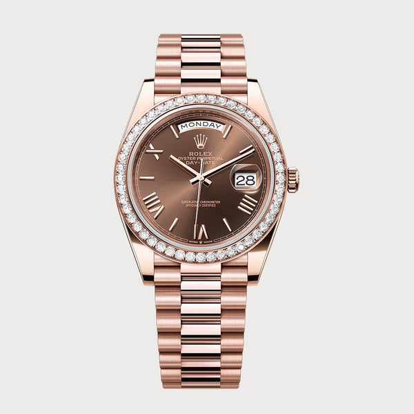 Rolex Day-Date 40 With Chocolate Roman Dial & Diamond Set Bezel In Rose Gold