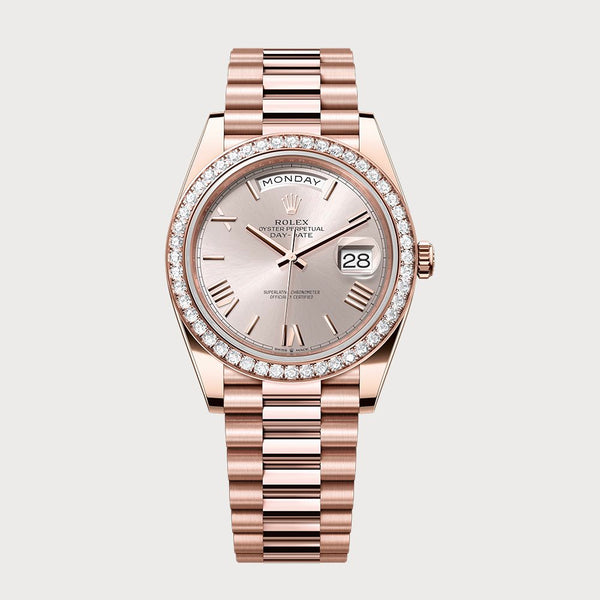 Rolex Day-Date 40 With Sundust Roman Dial & Diamond Set Bezel In Rose Gold