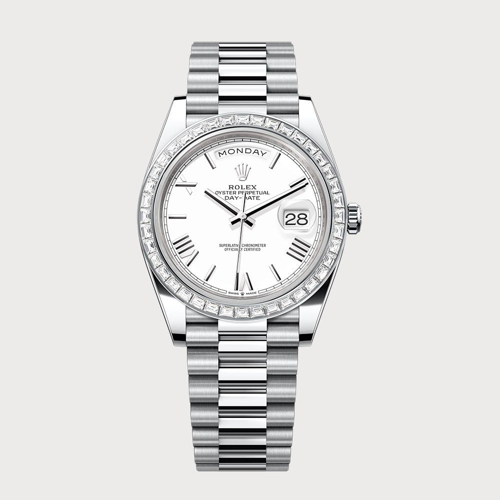Rolex Day-Date 40 With White Roman Dial & Baguette Diamond Bezel In Platinum