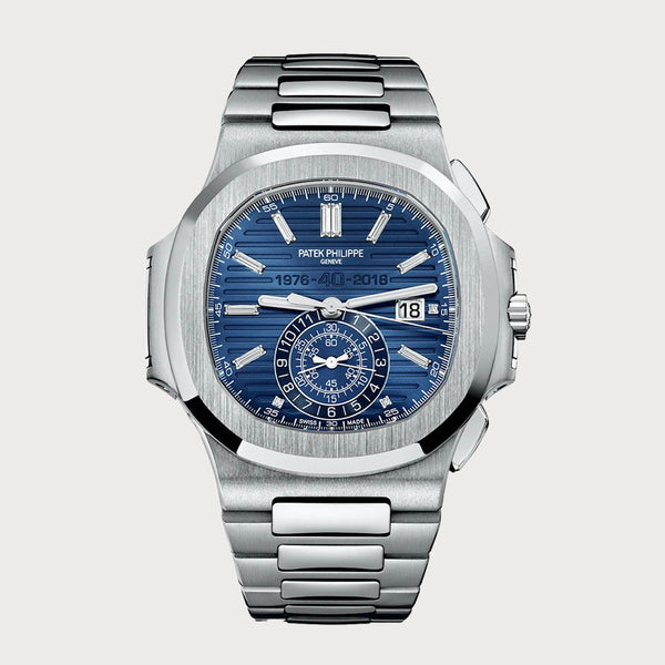 Patek Philippe Nautilus 40th Anniversary Baguette Diamond Set Blue Dial In Platinum