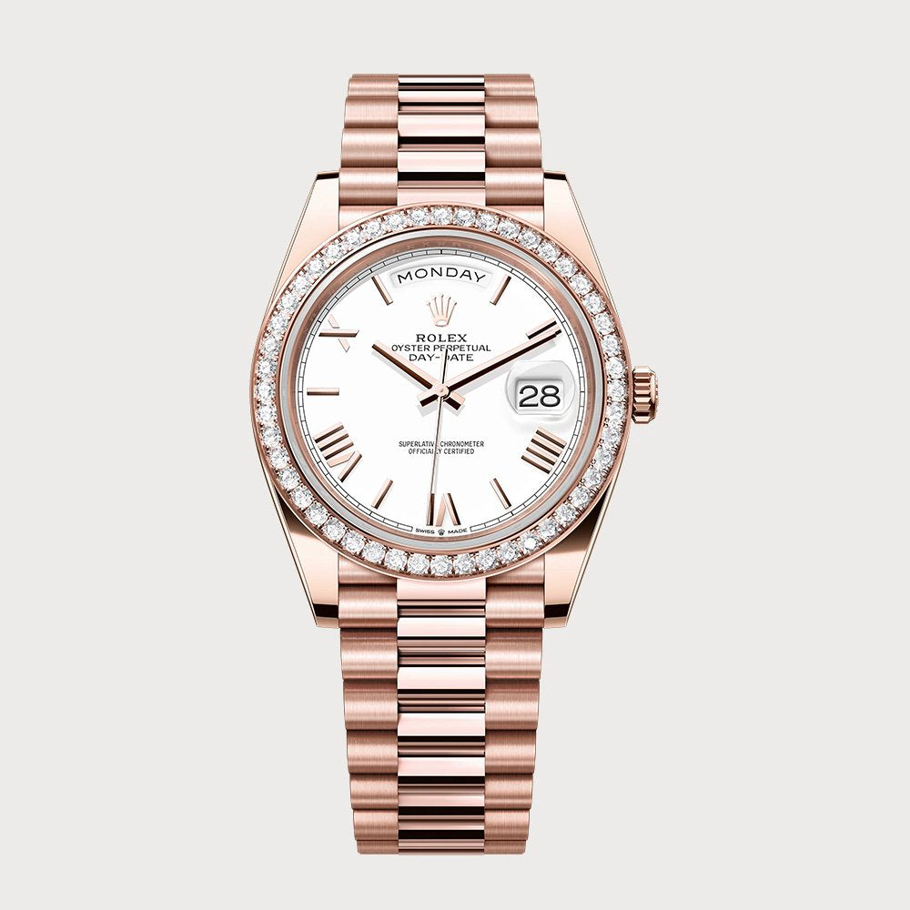 Rolex Day-Date 40 With White Roman Dial & Diamond Set Bezel In Rose Gold