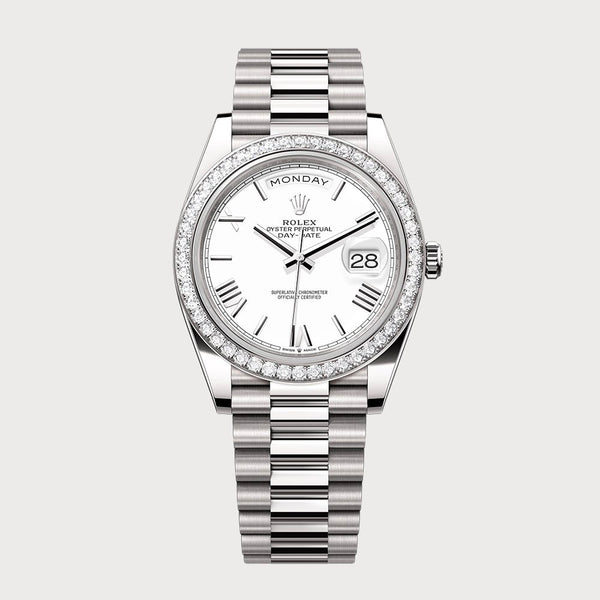 Rolex Day-Date 40 With White Roman Dial & Diamond Bezel In White Gold