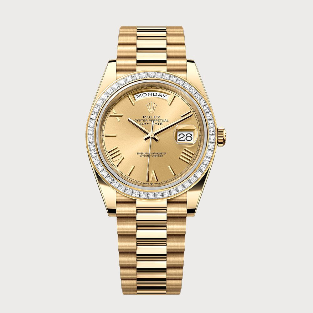 Rolex Day-Date 40 Roman Champagne Dial & Baguette Diamond Bezel In Yellow Gold